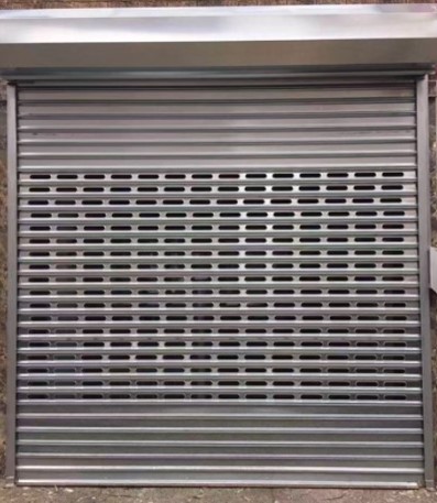 Compliant open grid security gate